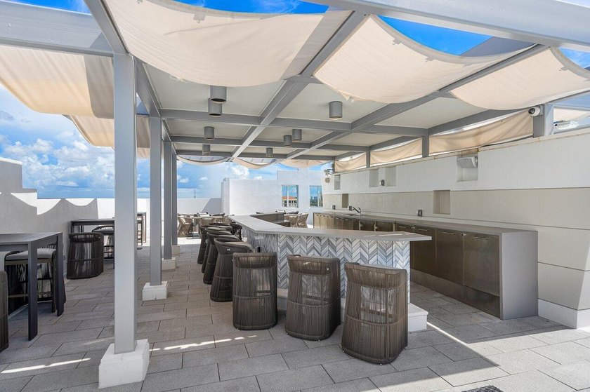Step into the epitome of modern luxury with Unit 611 at Tower - photo 45