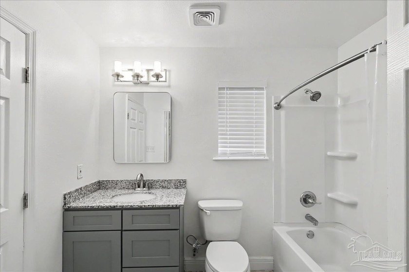 Welcome to this beautifully updated 3-bedroom, 2-bath brick home - photo 18