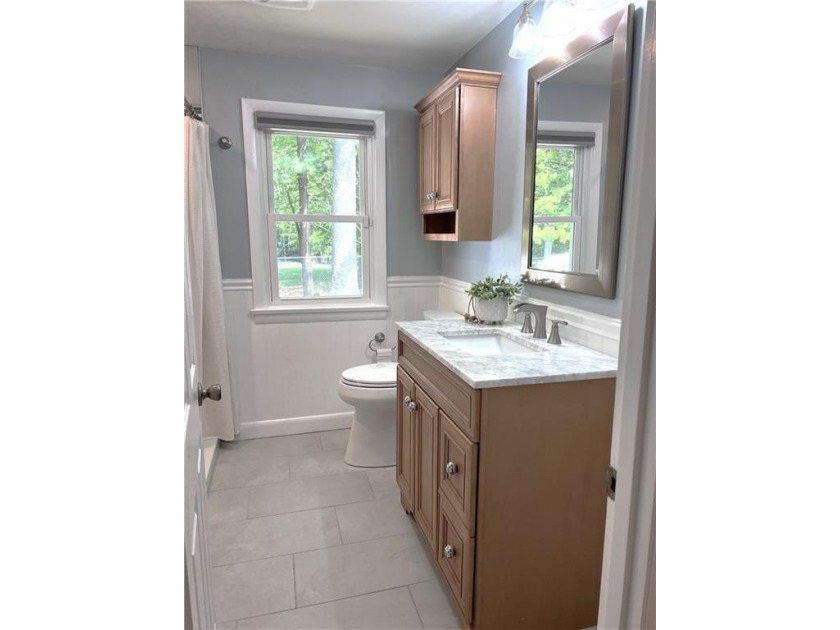 Bright, airy, and thoughtfully updated, this move-in ready ranch - photo 19