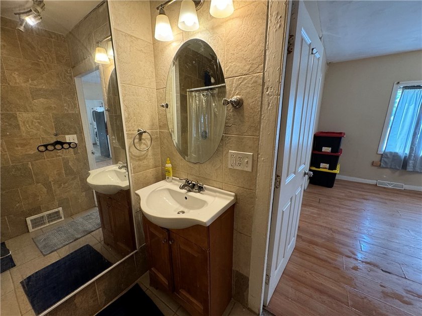 Welcome to 604 Upper Falls Blvd! This home offers two completely - photo 13