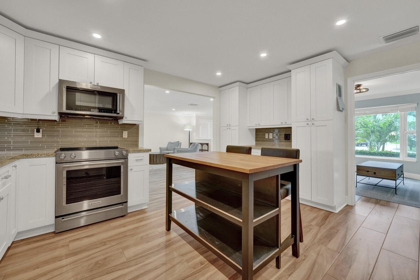 Welcome to this beautifully maintained golf course residence in - photo 14