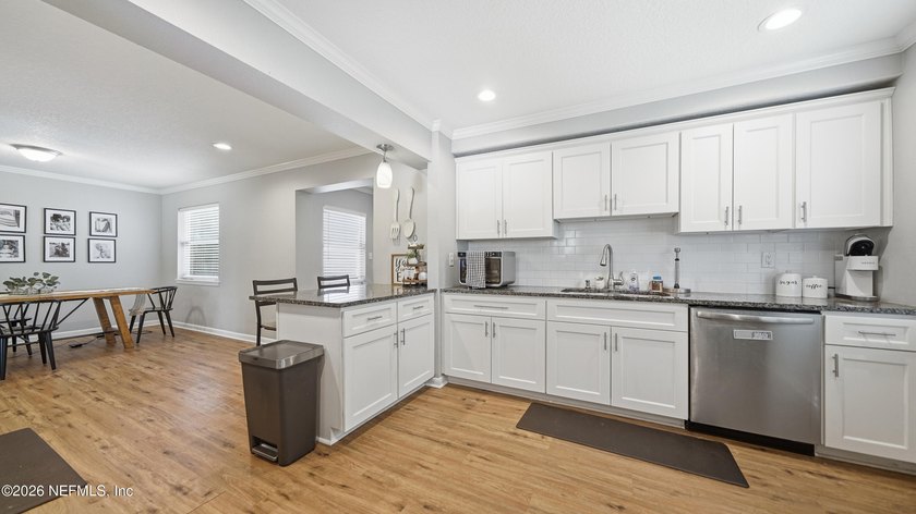 Welcome to this beautifully renovated 4-bedroom, 3-bathroom - photo 15
