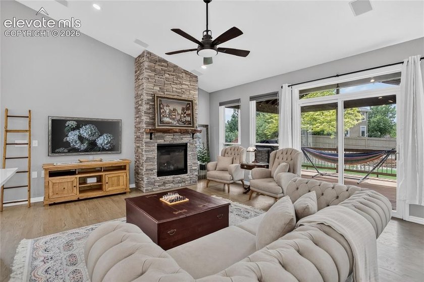 This mature 0.28-acre Pine Creek property offers a thoughtfully - photo 4