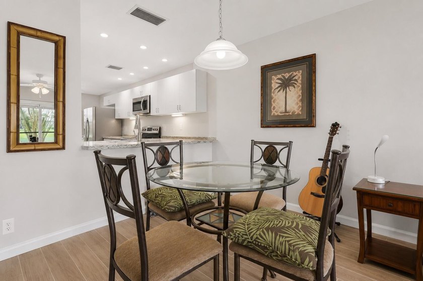 Beautifully renovated lakefront corner first-floor condo - photo 12