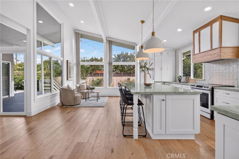 Exceptional custom-remodeled residence tucked away at the end of - photo 2