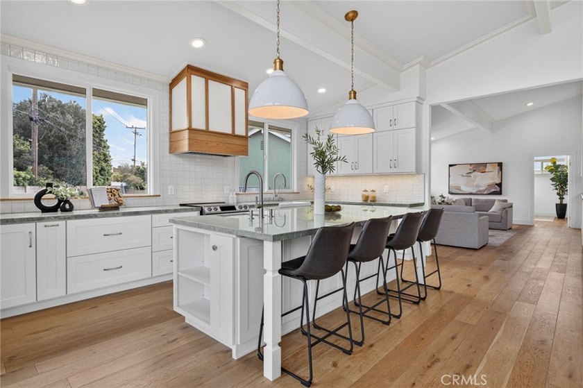 Exceptional custom-remodeled residence tucked away at the end of - photo 4