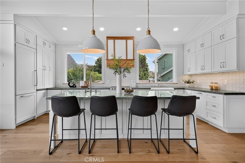 Exceptional custom-remodeled residence tucked away at the end of - photo 5