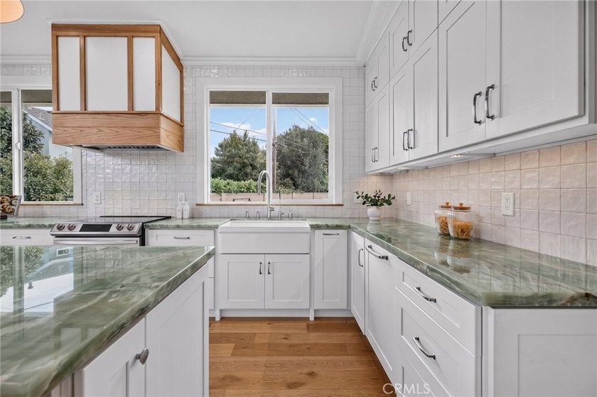 Exceptional custom-remodeled residence tucked away at the end of - photo 7