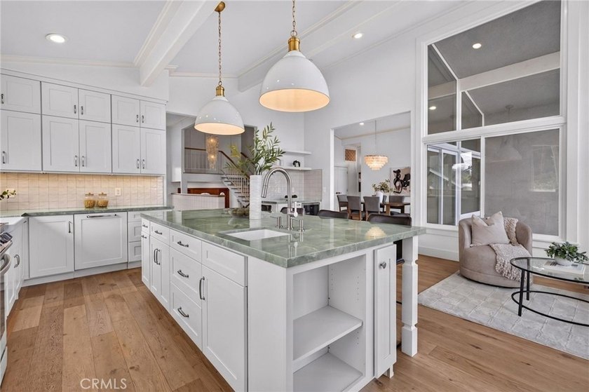 Exceptional custom-remodeled residence tucked away at the end of - photo 8