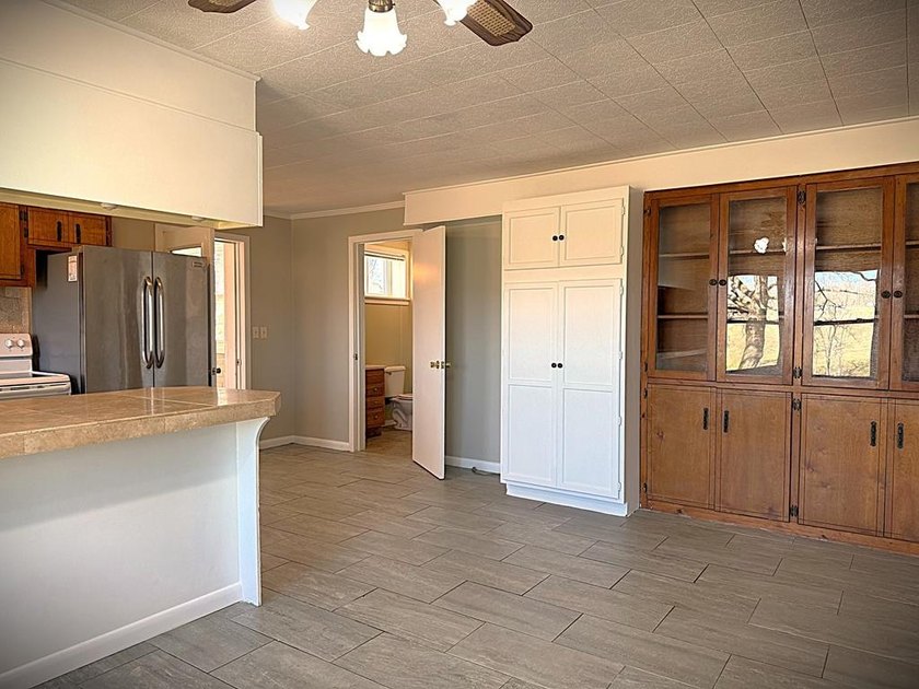 Tucked away on 5 fully fenced acres, this unique 3-bed, 2-bath - photo 42
