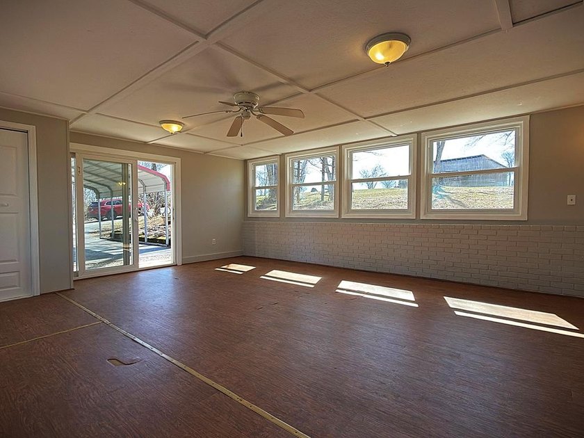 Tucked away on 5 fully fenced acres, this unique 3-bed, 2-bath - photo 46