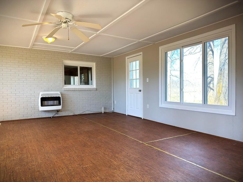 Tucked away on 5 fully fenced acres, this unique 3-bed, 2-bath - photo 47