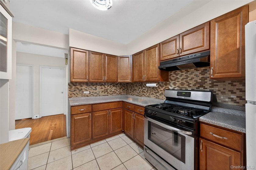 Well-maintained 3-story, 2-family brick home featuring a - photo 7
