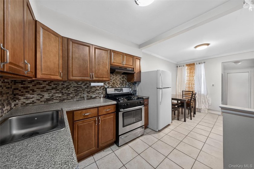 Well-maintained 3-story, 2-family brick home featuring a - photo 8