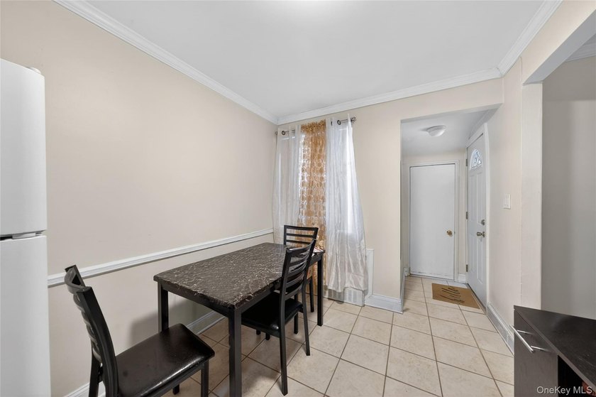Well-maintained 3-story, 2-family brick home featuring a - photo 9
