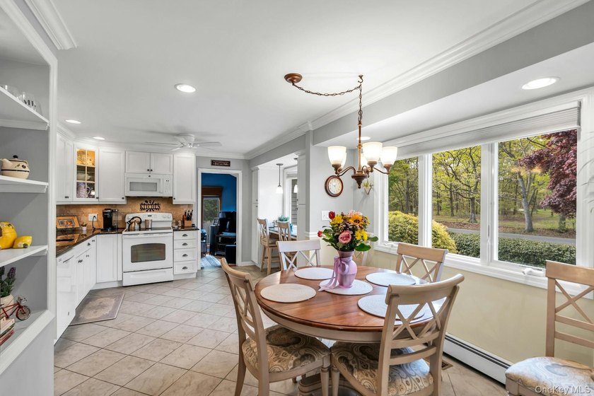 This lovely, immaculate expanded ranch in Country Village - photo 13