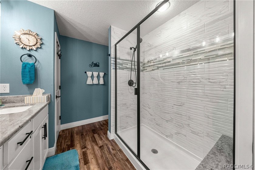 THIS HOME HAS IT ALL! Beautiful custom-built pool home in - photo 13