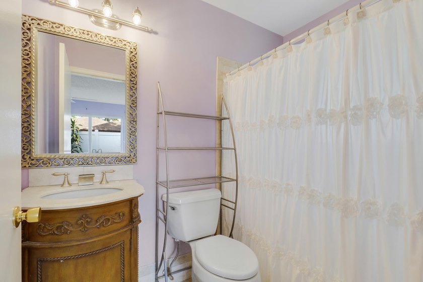 Welcome to this charming 3-bedroom, 2-bathroom villa situated in - photo 15