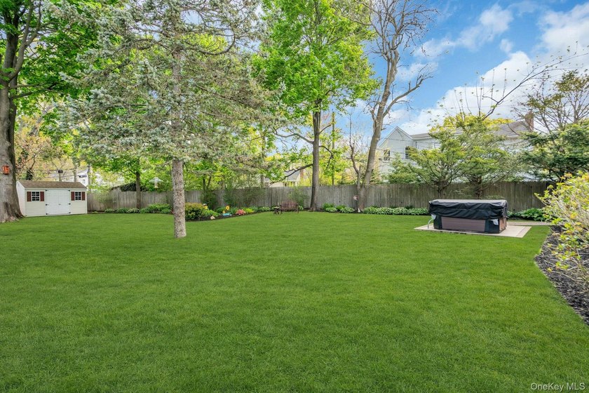 This lovely, immaculate expanded ranch in Country Village - photo 31