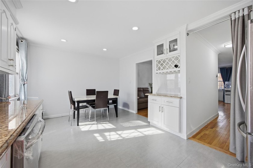 Sun filled, fully brick above ground 3 story townhouse with open - photo 5