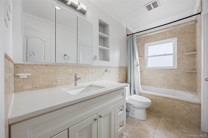 Sun filled, fully brick above ground 3 story townhouse with open - photo 10