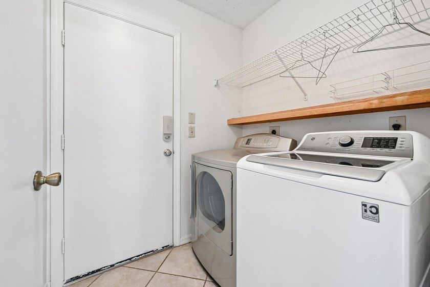 Tucked away in a private setting, this charming 3-bedroom - photo 16