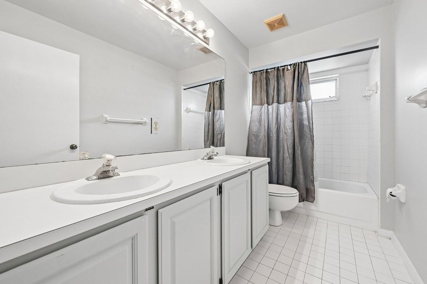 Tucked away in a private setting, this charming 3-bedroom - photo 19