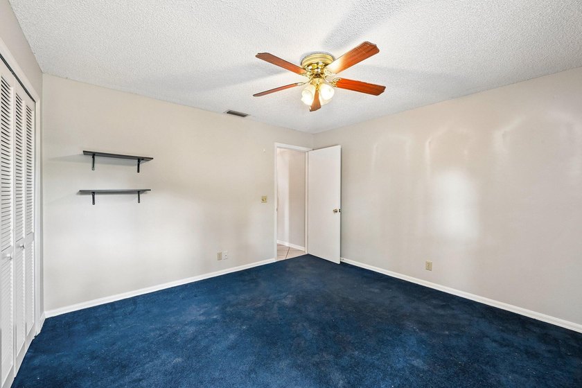 Tucked away in a private setting, this charming 3-bedroom - photo 21