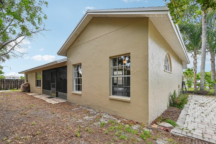 Tucked away in a private setting, this charming 3-bedroom - photo 25
