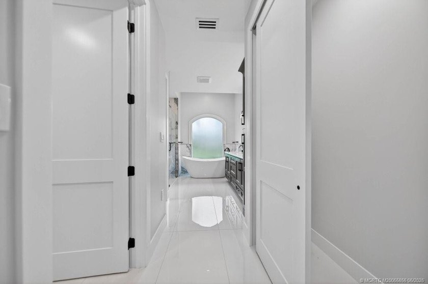 THE MOST COMPREHENSIVELY RENOVATED HOME IN PALM CITY - photo 12