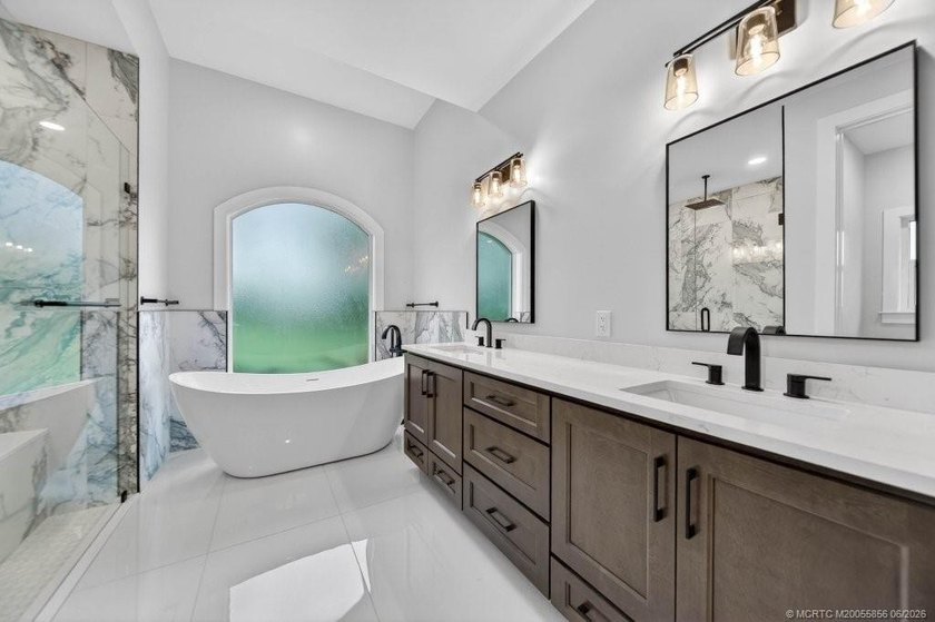 THE MOST COMPREHENSIVELY RENOVATED HOME IN PALM CITY - photo 13