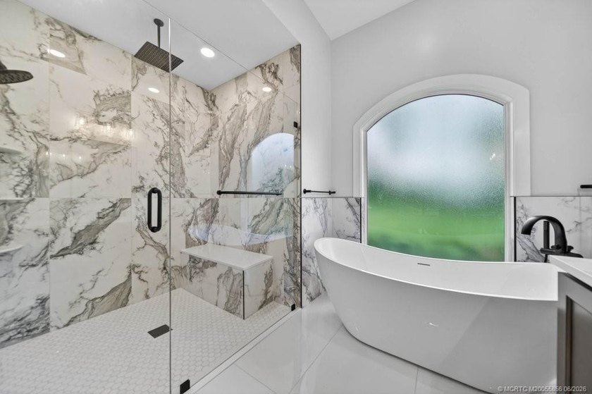 THE MOST COMPREHENSIVELY RENOVATED HOME IN PALM CITY - photo 14