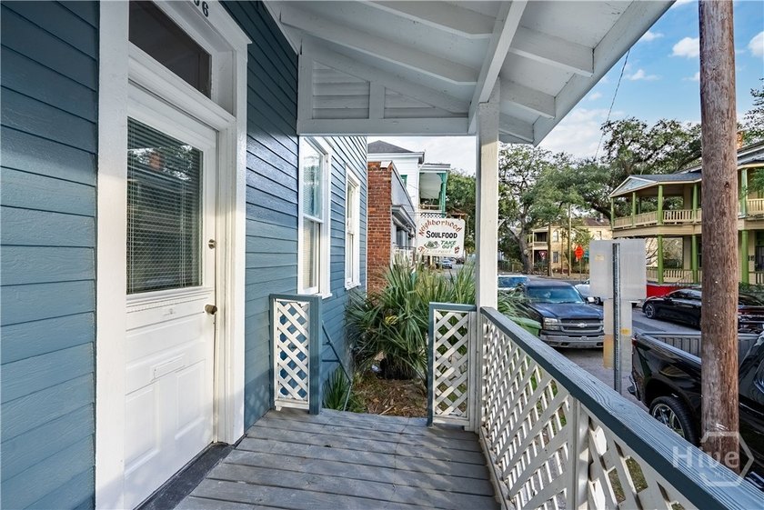 This well-maintained four-unit property offers investors a rare - photo 3
