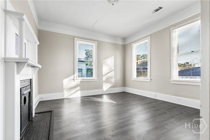 This well-maintained four-unit property offers investors a rare - photo 8