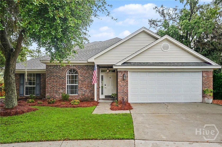 This thoughtfully updated and maintained 4-bedroom ranch sits on - photo 2