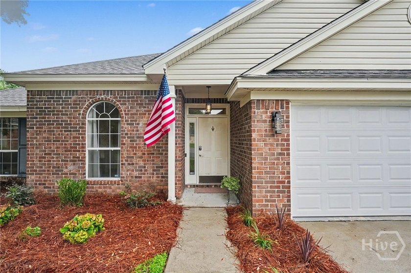 This thoughtfully updated and maintained 4-bedroom ranch sits on - photo 3