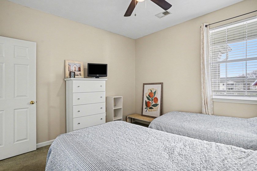Enjoy comfortable coastal living in this charming two-bedroom - photo 18