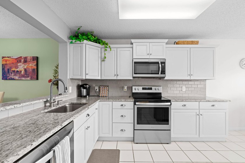 ABSOLUTELY GORGEOUS WATERFRONT 4TH FLOOR CONDO | PRESTIGIOUS 55+ - photo 9