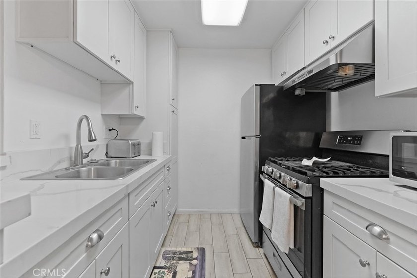 Welcome to a masterfully reimagined, move-in-ready home where - photo 17