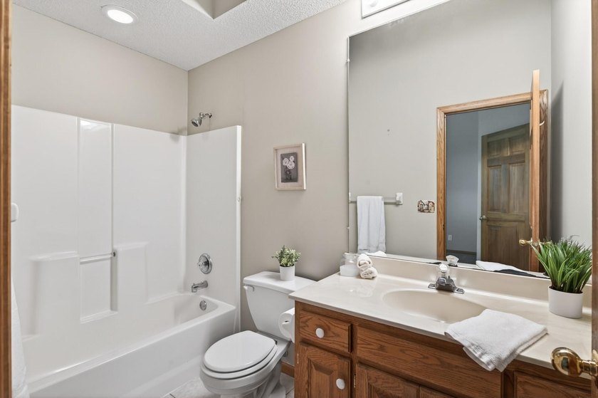 This beautiful 2 bedroom, 2 bath end-unit townhome offers tons - photo 22