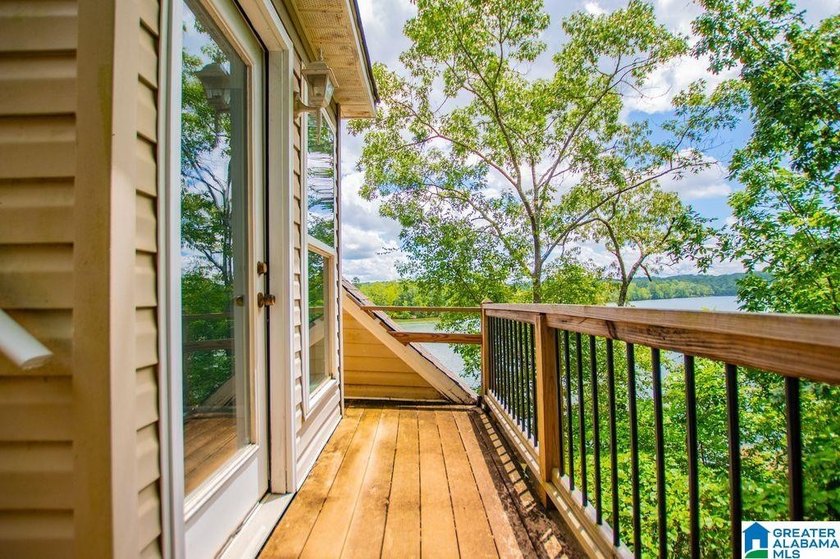 This is a great lake home with a roof top deck the has awesome - photo 29
