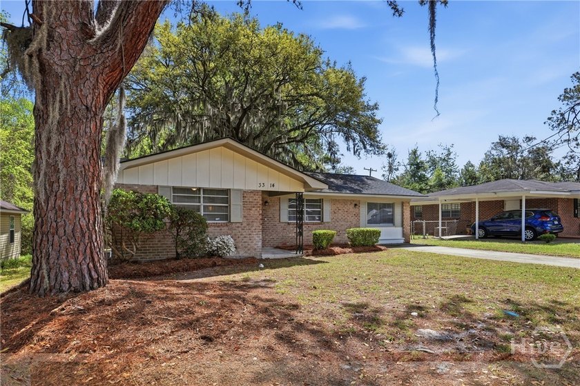 Updated, affordable, and full of potential, this all-brick ranch - photo 3