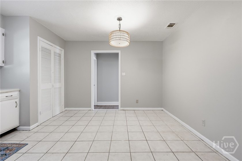 Updated, affordable, and full of potential, this all-brick ranch - photo 8
