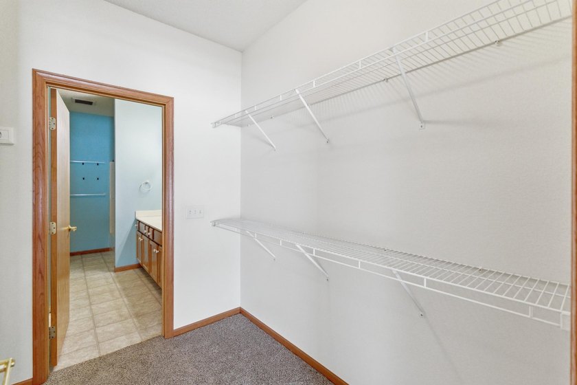 This well-maintained one-level townhome offers approximately 1 - photo 21