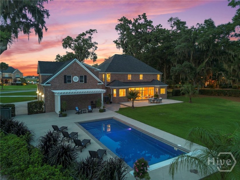 Nestled beneath majestic live oaks on a picturesque 1.9-acre - photo 6