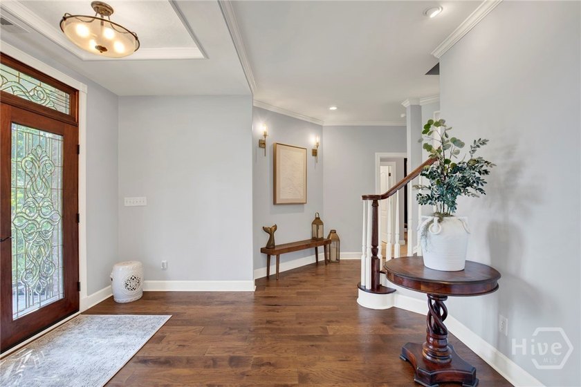 Nestled beneath majestic live oaks on a picturesque 1.9-acre - photo 9