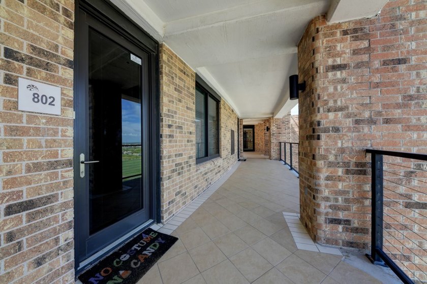 Experience elevated coastal living in this stunning 8th-floor - photo 2