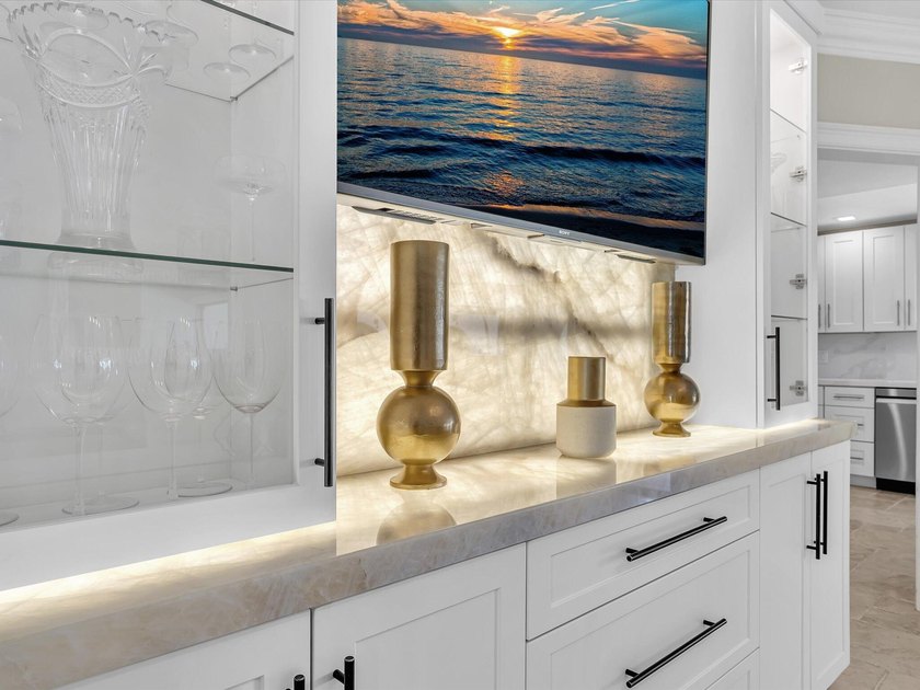 Rarely available deep water oversized lot. Newly updated home - photo 13