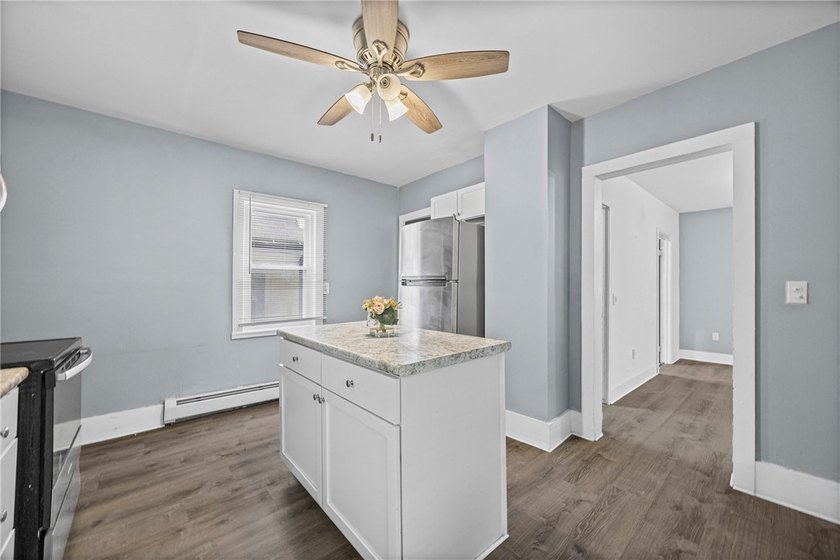 Welcome to 171 Oakland Street! This 4-bedroom, 2-bath home - photo 15