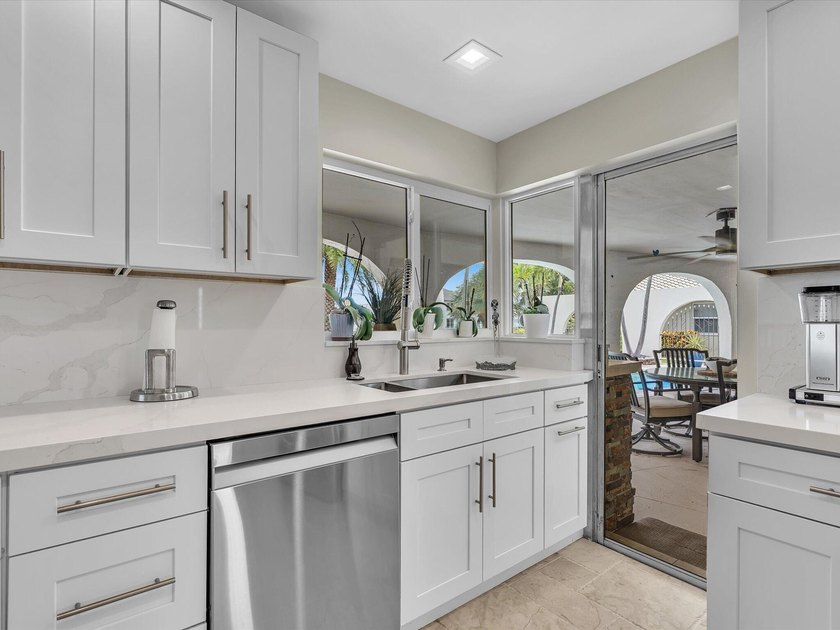 Rarely available deep water oversized lot. Newly updated home - photo 22